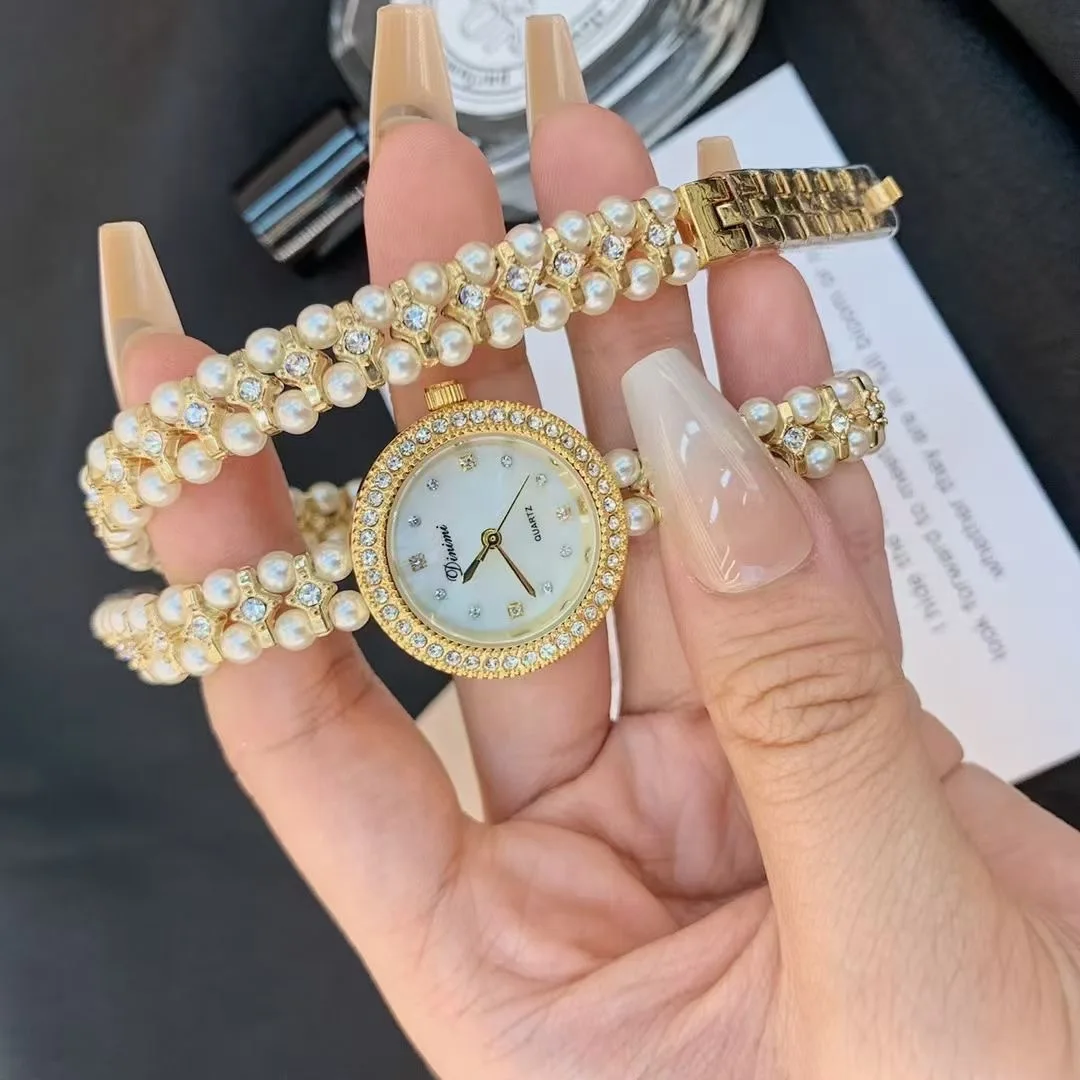 Dinimi long chain pearl show w – Luxury Watch From China recenzja i cena